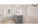 Bathroom with double vanity, garden tub, and view of bedroom at 619 Whitman (2200) Ln, Stockbridge, GA 30281