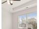 Bright bedroom with window and ceiling fan at 569 Whitman (Lot 159) Ln, Stockbridge, GA 30281