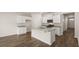 Kitchen with island and stainless steel appliances at 569 Whitman (Lot 159) Ln, Stockbridge, GA 30281