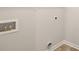 Laundry area with hookups and built-in shelving at 569 Whitman (Lot 159) Ln, Stockbridge, GA 30281