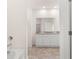 Bright bathroom with double vanity and shower at 569 Whitman (Lot 159) Ln, Stockbridge, GA 30281
