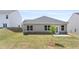 Ranch home with a small backyard and patio at 569 Whitman (Lot 159) Ln, Stockbridge, GA 30281
