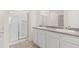 Bathroom with double vanity and granite countertop at 569 Whitman (Lot 159) Ln, Stockbridge, GA 30281