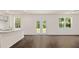 Spacious living room with hardwood floors and sliding glass doors at 576 Whitman (2020) Ln, Stockbridge, GA 30281