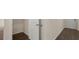 Hardwood floors and neutral walls in a bright hallway at 576 Whitman (2020) Ln, Stockbridge, GA 30281
