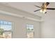 Bright bedroom with ceiling fan and large windows at 576 Whitman (2020) Ln, Stockbridge, GA 30281