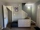 Small sitting area with chaise lounge, near staircase and door at 300 Flagstone Way, Austell, GA 30168