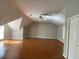 Large bedroom with hardwood floors, dormer windows and ceiling fan at 1965 Tyler Trce, Lawrenceville, GA 30043