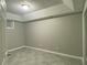 Spacious finished basement bedroom with tile floors and neutral walls at 1965 Tyler Trce, Lawrenceville, GA 30043