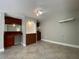 Finished basement with wet bar and tile floors at 1965 Tyler Trce, Lawrenceville, GA 30043