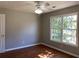 Bedroom with hardwood floors, ceiling fan and large windows at 1965 Tyler Trce, Lawrenceville, GA 30043