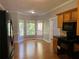 Breakfast nook area with bay window and hardwood floors at 1965 Tyler Trce, Lawrenceville, GA 30043