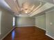Spacious bedroom with hardwood floors and ceiling fan at 1965 Tyler Trce, Lawrenceville, GA 30043