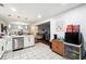 Modern kitchen with white cabinetry and breakfast bar at 386 Black Oak Ct, Lawrenceville, GA 30046