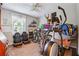 Multipurpose room with exercise equipment and home office space at 386 Black Oak Ct, Lawrenceville, GA 30046