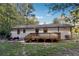 Home's backyard with deck and grill at 386 Black Oak Ct, Lawrenceville, GA 30046