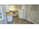 Bright kitchen with white cabinets and appliances at 3226 Bruckner Blvd, Snellville, GA 30078