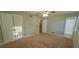 Main bedroom with carpet, ceiling fan, and ample closet space at 3226 Bruckner Blvd, Snellville, GA 30078