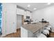 Modern kitchen with granite countertops and stainless steel appliances at 1916 School House Ln, Temple, GA 30179