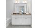 Bathroom features a double vanity with granite countertops at 1916 School House Ln, Temple, GA 30179