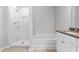 Bathroom includes a shower/tub combo and granite vanity at 1916 School House Ln, Temple, GA 30179