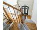 View from above of a staircase with wood and metal accents at 3939 Perry Pass, Lithonia, GA 30038