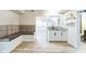 Finished basement with built-in seating and kitchenette at 3939 Perry Pass, Lithonia, GA 30038