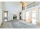 Bright living room with hardwood floors, high ceilings, and fireplace at 3939 Perry Pass, Lithonia, GA 30038