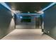 Finished basement home theater with a large screen and LED lighting at 3939 Perry Pass, Lithonia, GA 30038