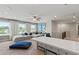Open concept bonus room with sectional sofa and a built-in counter at 402 Beacon Way, Villa Rica, GA 30180