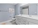 Bathroom with double vanity and a shower/tub combo at 402 Beacon Way, Villa Rica, GA 30180