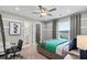 Bedroom with desk area and large window with natural light at 402 Beacon Way, Villa Rica, GA 30180