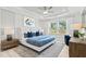 Main bedroom with king-size bed and sitting area at 402 Beacon Way, Villa Rica, GA 30180