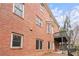 Brick home exterior with deck and wooded views at 2865 Payton Oaks Ne Dr, Atlanta, GA 30345