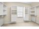Large walk-in closet with ample shelving and hanging space at 2865 Payton Oaks Ne Dr, Atlanta, GA 30345