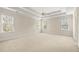 Large bedroom with high ceilings and carpet at 2865 Payton Oaks Ne Dr, Atlanta, GA 30345