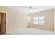 Spacious bedroom with neutral walls, ceiling fan, and carpet flooring at 2865 Payton Oaks Ne Dr, Atlanta, GA 30345