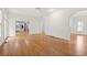 Open living room with hardwood floors and views into kitchen at 2865 Payton Oaks Ne Dr, Atlanta, GA 30345