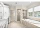 Bathroom with soaking tub and walk-in shower at 2865 Payton Oaks Ne Dr, Atlanta, GA 30345