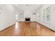 Hardwood floor living room with fireplace and built-ins at 2865 Payton Oaks Ne Dr, Atlanta, GA 30345