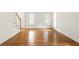 Spacious living room featuring hardwood floors and large windows at 2865 Payton Oaks Ne Dr, Atlanta, GA 30345