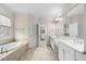 Large bathroom with double vanity and soaking tub at 2865 Payton Oaks Ne Dr, Atlanta, GA 30345