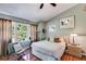 Bright bedroom with hardwood floors and large windows at 3971 Wolcott Cir # 3971, Atlanta, GA 30340