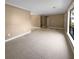 Bright living room with neutral tile floors and plenty of natural light at 125 Cainwood W Ct, Atlanta, GA 30349