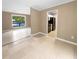 Open dining area with view into the living room and kitchen at 125 Cainwood W Ct, Atlanta, GA 30349