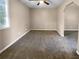 Bright bedroom with neutral walls and carpet at 125 Cainwood W Ct, Atlanta, GA 30349