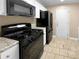 View of kitchen stove and appliances at 125 Cainwood W Ct, Atlanta, GA 30349