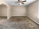Bright living room with neutral walls and carpet at 125 Cainwood W Ct, Atlanta, GA 30349