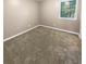Simple bedroom with neutral walls and carpeted floors at 125 Cainwood W Ct, Atlanta, GA 30349