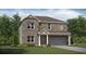 Two story home with brick facade and attached garage at 1261 Arnhem Dr, Hampton, GA 30228